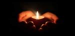 candle-hands-for-prayer